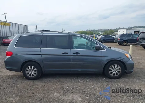 2010 Honda Odyssey Ex-L z USA, uszkodzony, nr VIN 5FNRL3H62AB052919